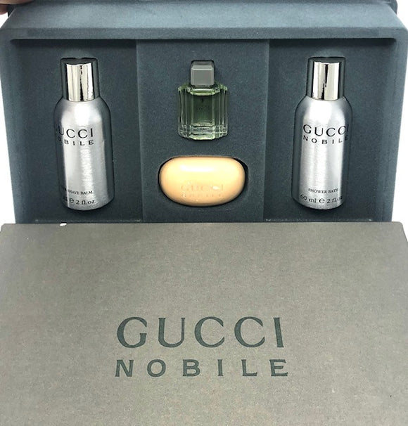 Gucci Nobile  by Gucci for Men 4-Piece Set: 5 ml/0.17 oz Eau de Toilette Mini,  1 oz Soap, 2 oz After Shave Balm, 2 oz Shower Gel